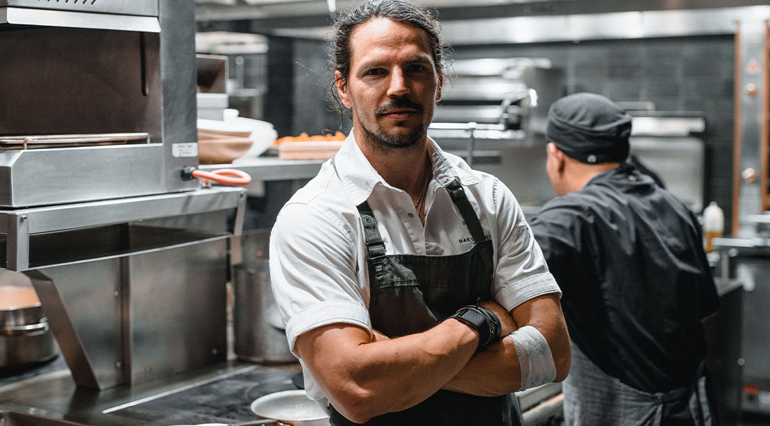 Chef Dan Churchill in the kitchen of his restaurant The Osprey in Brooklyn’s 1 Hotel